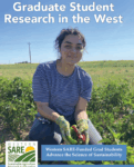 woman in field holding chiles